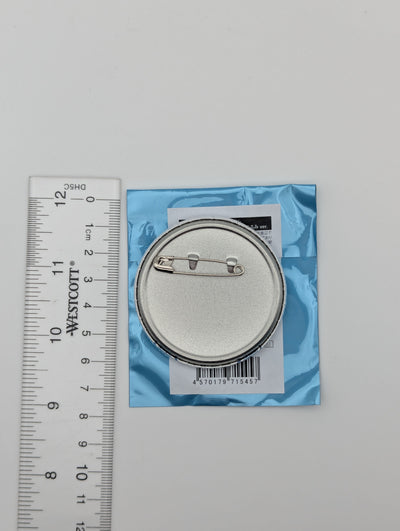 Eiden Nu: Carnival Can Badge