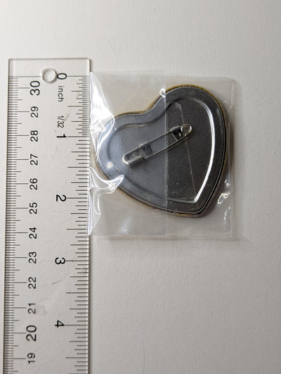 Toma Amnesia Can Badge