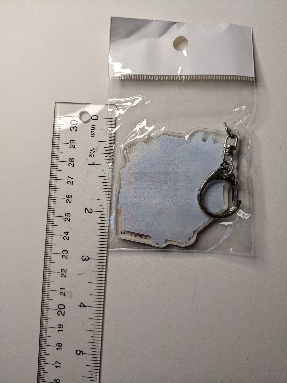 Ortho Shroud Twisted Wonderland Acrylic Keychain