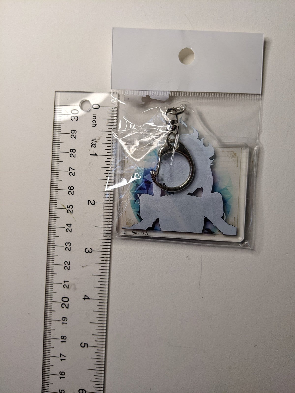Ortho Shroud Twisted Wonderland Acrylic Keychain